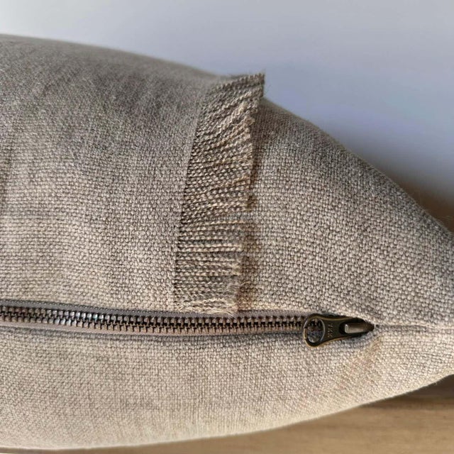 A gorgeous stonewashed Linen Sewn with a brass zipper closure and overlocked seams, this nubby linen textured pillow in...