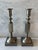 Pair of vintage heavy solid brass (silver tone) candlesticks with square bases and six sided geometric shafts. Marked...