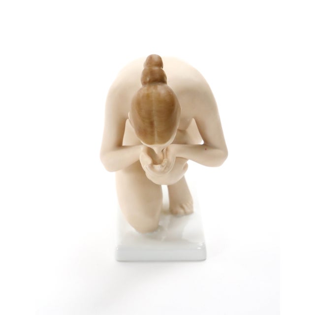An exquisite early 20th-century German Rosenthal porcelain figure titled “Trinkende” (“The Drinker”), designed by the...