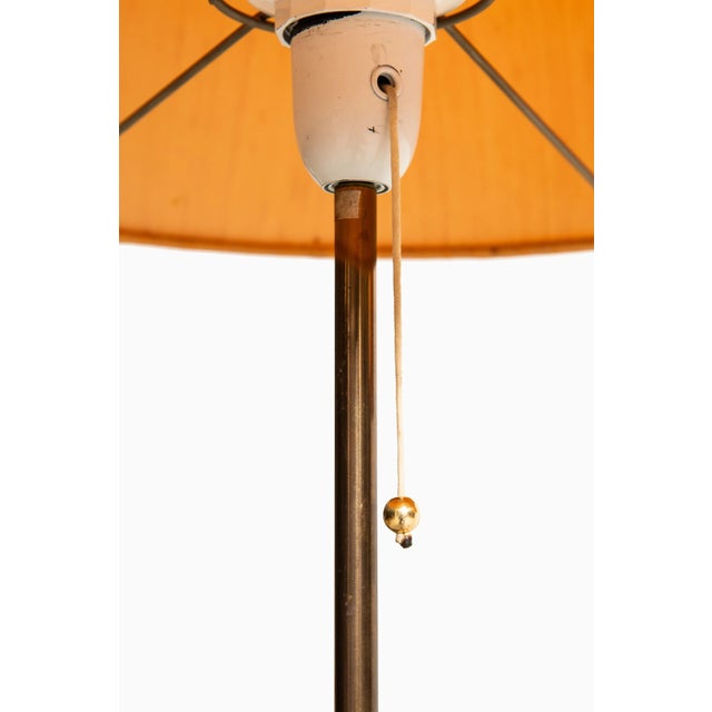 Rare pair of floor lamps model G-024 designed by Alf Svensson & Yngvar Sandström. Produced by Bergbom in Sweden. This...