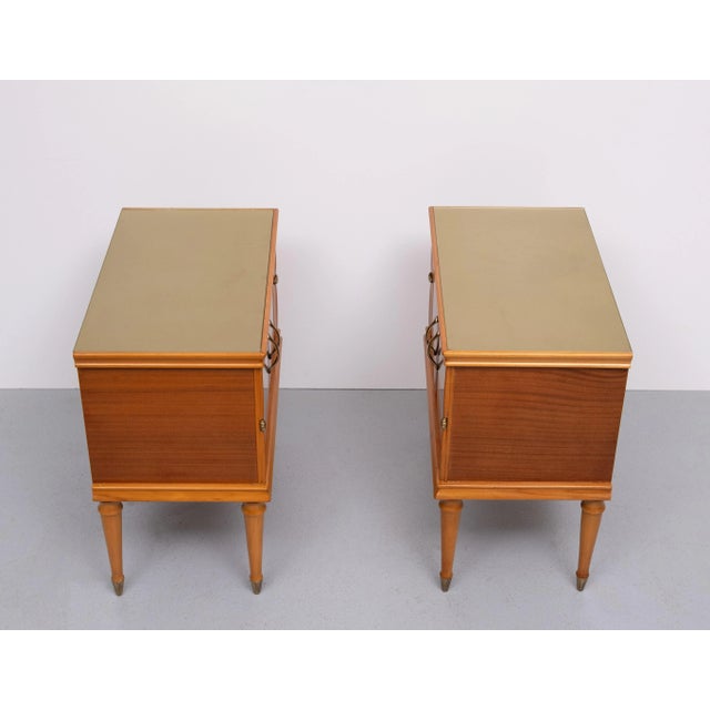 Look at this stunning pair of Italian Night stands comes with Gold Glass tops . Very good condition . 1950s Italian .