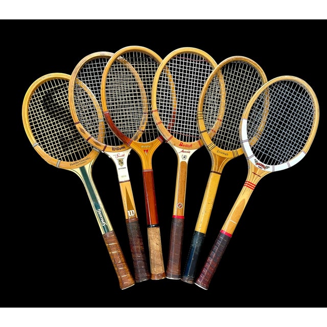 This Vintage Wooden Tennis Rackets Wall Display Set includes 6 classic tennis rackets from well-known brands such as...