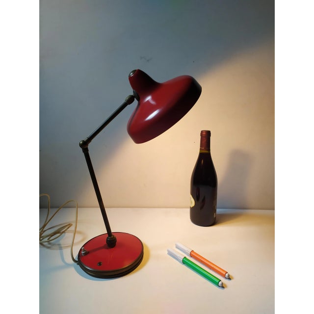 This table lamp is attributed to Arredoluce for form and style. No label and Mark. This piece is attributed to the...