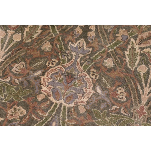 Designed with mesmerizing intricacy and gorgeous color palette, this hand-knotted masterpiece demonstrates the beauty and...