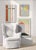 This piece features a row of colorful columns of opposing shapes made from paint and color pencil on paper. Colors include...