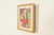 A beautiful vibrant abstract cubist-style depiction of a woman with a cat serigraph in carved giltwood frame Entitled...