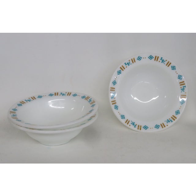 This lovely Set of Three Bowls is made of milk glass. These gorgeous restaurant bowls are white color with the teal and...