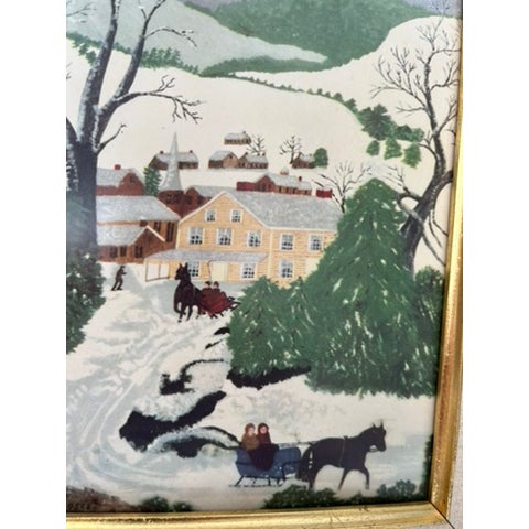 A single vintage winter landscape scene finished with a carved wood frame, gilt trim, glass, and fabric covered mat.