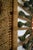 This is a vintage macrame wall hanging, made by hand in America. The piece is sized to fill a wall area with the concept...