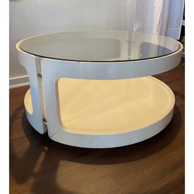 Geometry and clean these are the principles behind this round white glass coffee table, in Joe Colombo style, Italy 1980s....