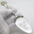 This vintage silver tableware object depicts a cake server with a grapevine and grape cluster relief handle, crafted as a...