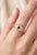 Elevate your jewelry collection with this refined gemstone signet ring. Expertly crafted in 18K gold plating over 925...