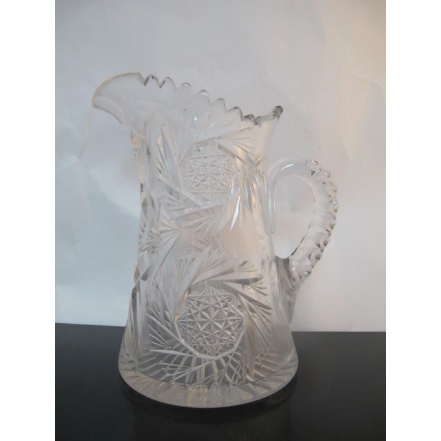 Beautiful American Brilliant period cut glass pitcher. Measures 9.5" tall x 5.5" x 7". Excellent condition, no chips,...