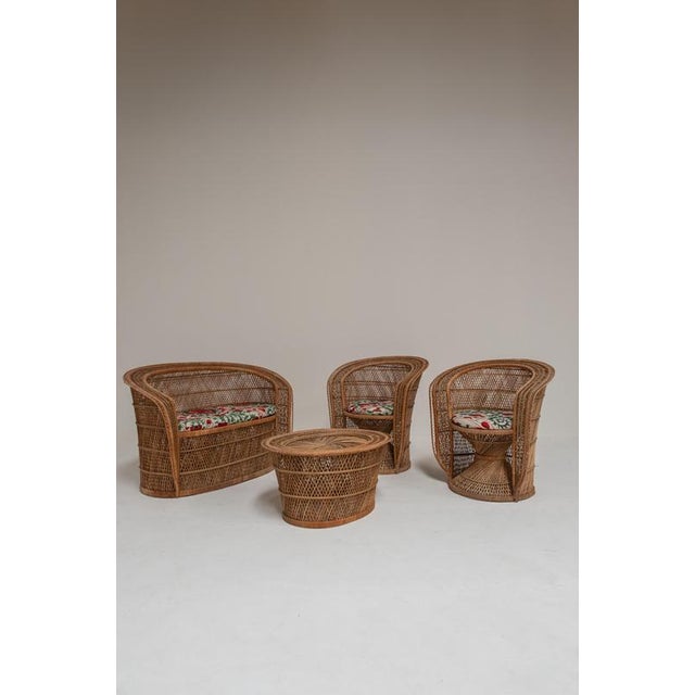 Beautiful and highly decorative Swedish rattan lounge set from the 1970s, consisting of a two-seater bench, two matching...