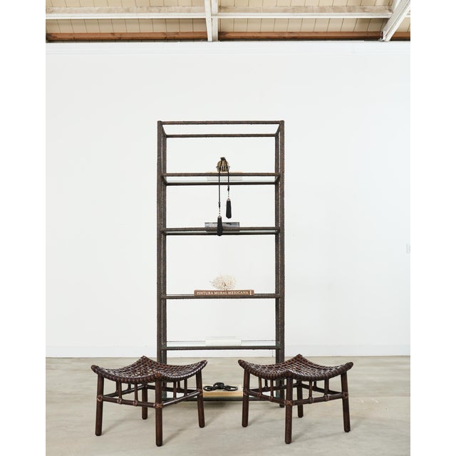 Fantastic iron six shelf etagere display featuring a bronzed faux-bois distressed finish. The frame is crafted from thick...