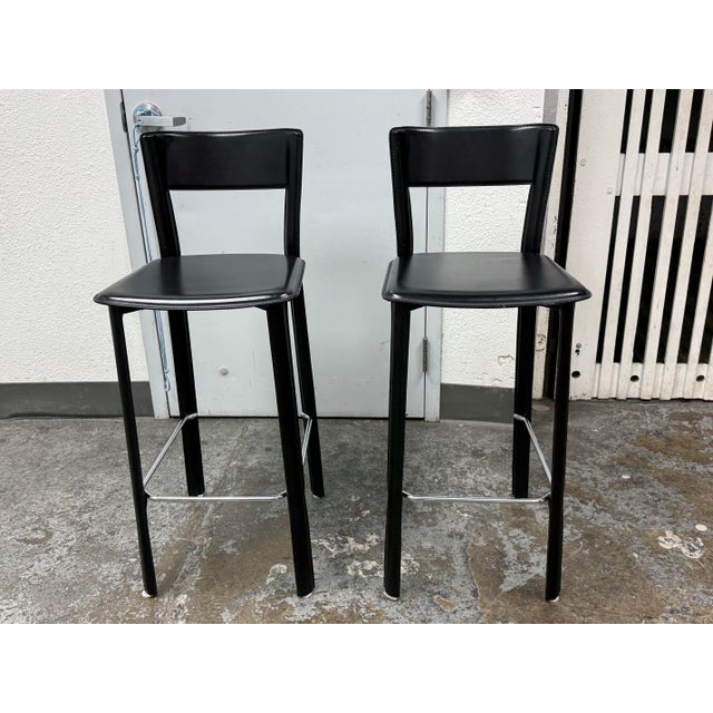 Design Plus Gallery presents a Pair of Italian Leather Barstools by Frag for Design Within Reach. These vintage barstools...