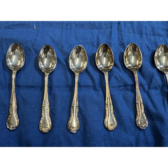 Set of 12 Mappin and Webb silver-plated teaspoons, Russell pattern - L=13cm This piece has an attribution mark, I am sure...