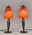 Charles Schneider A wonderful pair of 1925-30 French art deco lamps in wrought iron. The forged bases hold nice colored...