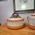 This exceptional two-piece studio pottery set by Sandra Schmitt, associated with McKenzie River Pottery, exemplifies the...