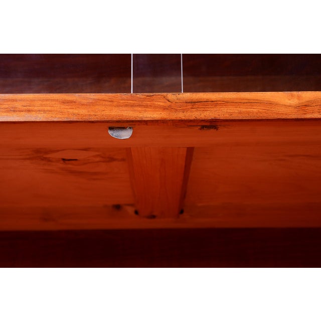 This luxurious commode, serving as a stylish cabinet with a showcase, is an authentic example of the refined Art Deco...