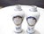 This pair of hand-painted porcelain vases have traces of gilding and monograms which are worn down. They have been drilled.