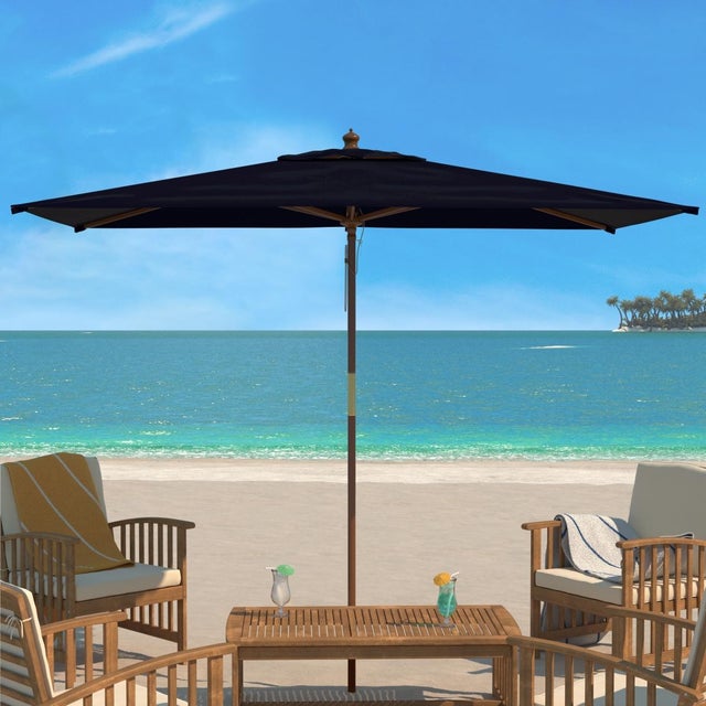 Create a stylish and shady retreat for any outdoor space with our Aklin market umbrella. Featuring a wide rectangular...