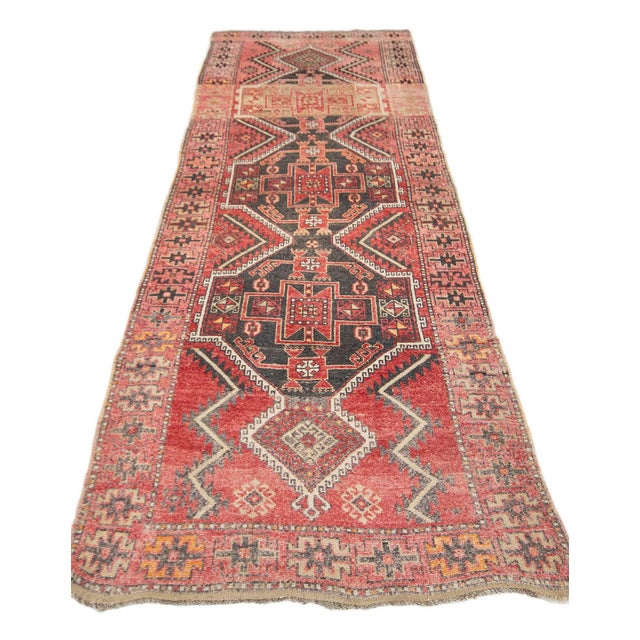 Vintage handknotted decorative runner rug from Malatya region of Turkey. Approximately 50-60 years old. In very good...