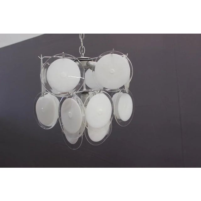 Murano Glass Disk Chandelier, 1970, in Flawless conditions. Designed 1970 to 1979 European Plug (up to 250V).The wiring of...