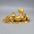 This charming gilt bronze sculpture depicts a family of guardian lions, or Foo Dogs, resting together on an integral base....