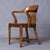 Handsome set of three solid wood chairs dating from the early 20th Century. This model is often called bankers or library...