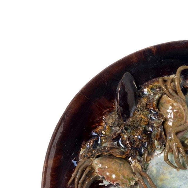 Earthenware - Large earthenware plate - 19th century (snake mark). Portuguese; manufactured in Caldas da Rainha. Caldas da...
