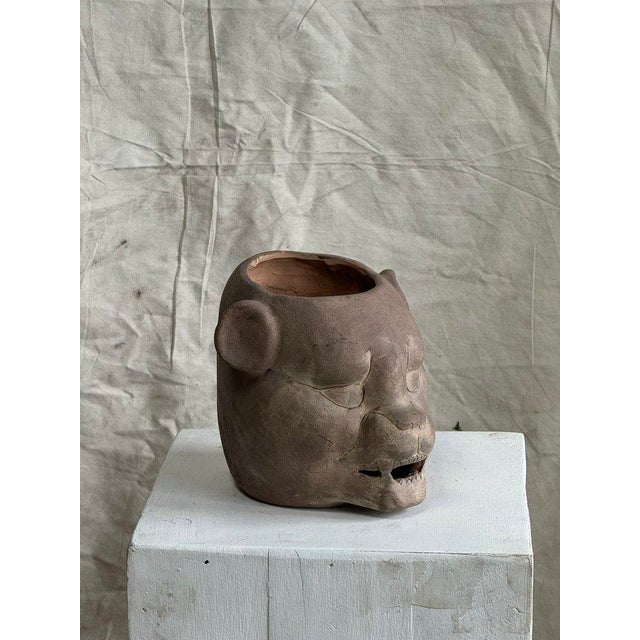 Crafted in homage to the ancient Jaguar zoomorphic pot from Tabasco, this replica captures the essence of Olmec...