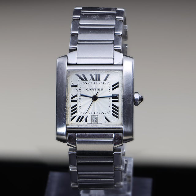 Cartier Tank Française ref. 2302 Large in stainless steel, circa 1996–1999, featuring a silver guilloché dial with black...