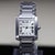 Cartier Tank Française ref. 2302 Large in stainless steel, circa 1996–1999, featuring a silver guilloché dial with black...
