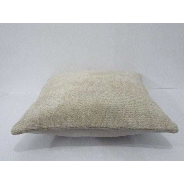 Decorative pillow cover made from a vintage Turkish handknotted rug. Backed with good quality cotton fabric. Pillow...