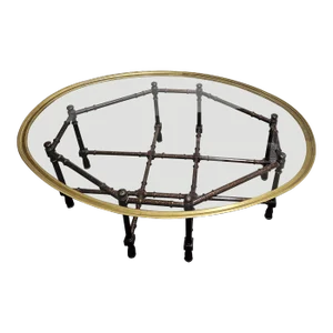 Brass and Glass Top Coffee or Cocktail Table Resting on a Tortoise Painted Faux Bamboo Chinoiserie Style Base by Baker Furniture Co.