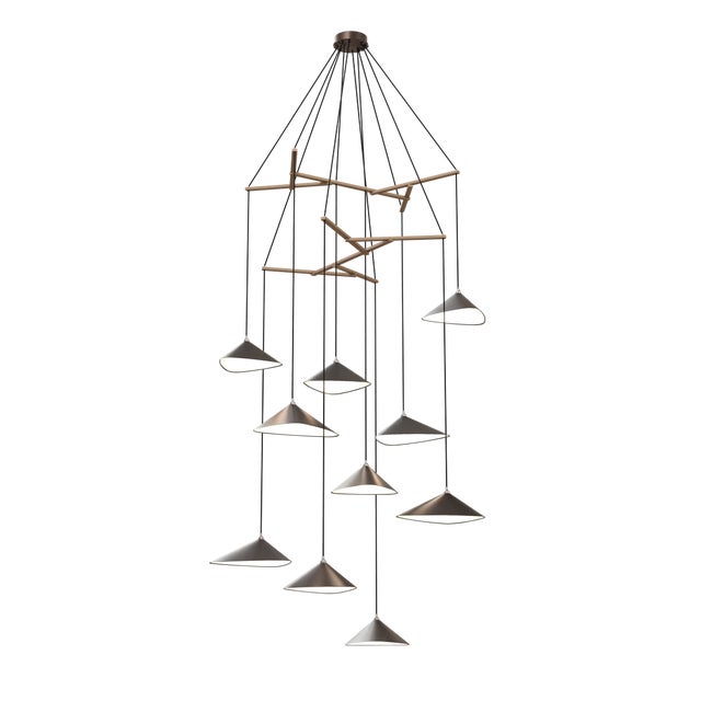 Emily is a series of handmade sheet steel lampshades in various finishes and spatial arrangements. The Vertical models of...