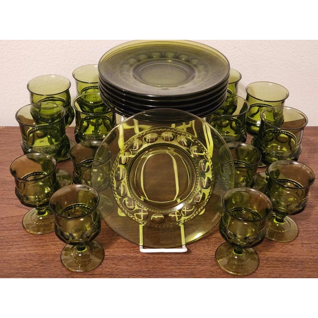 This is a set of luncheon plates, plus stemmed wine and water glasses. The Color Crown pattern is also referred to as...