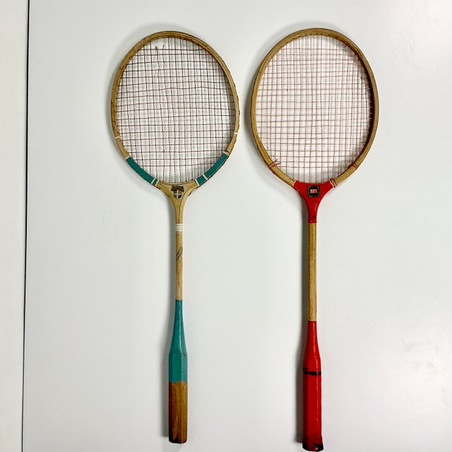 This is a fun vintage decor choice for a game room or cabana. These are wood Badminton Rackets from the 1950s. One has...