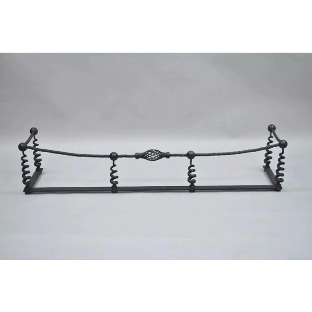Antique Arts & Crafts 56" Hand Wrought Iron Spiral Twist Fireplace Mantle Fender. Item features heavy solid iron...