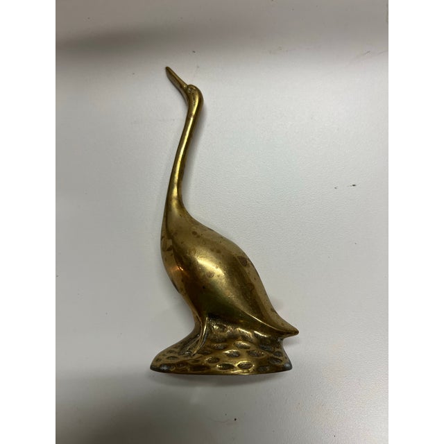 Tall brass swan statue. Brass swan measuring 7” tall.
