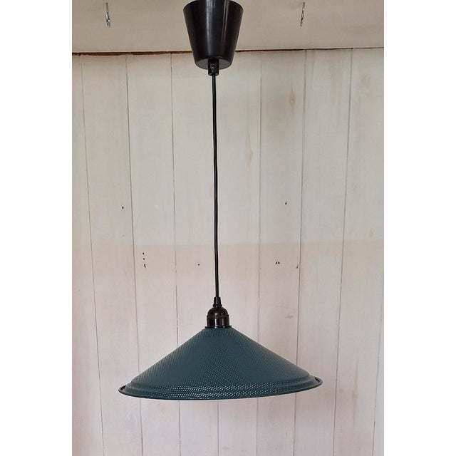 Vintage Pendant Lamp with Perforated Green Metal Shade and White Glass Undershade, 1980s, in Very Good conditions....