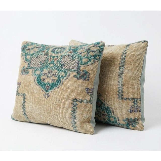 This beautiful 20'' x 20'' pillow cover set was made from authentic Turkish rug pieces. Bright colors of wool adorn the...