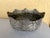 This vintage hammered silver-plated bowl is a stunning decorative piece that would enhance the beauty of any home. With...