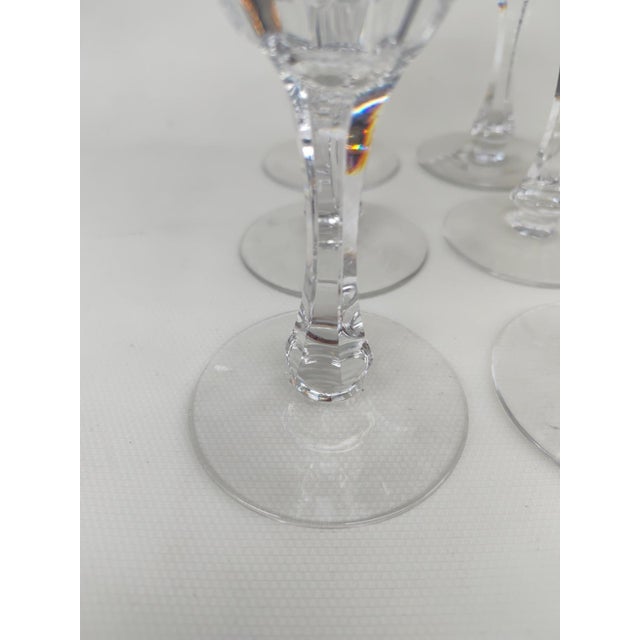 Twelve large Saint Louis crystal glasses, Moselle pattern, 1930s. One of the crystalworks' finest designs, it is very...