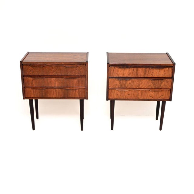 A beautifully designed pair of vintage Danish bedside chests of drawers, made in Denmark and dating from the 1960’s. The...