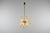 Mid-century chandelier with a dandelion-style composition, designed to create a diffused and reflective light effect...