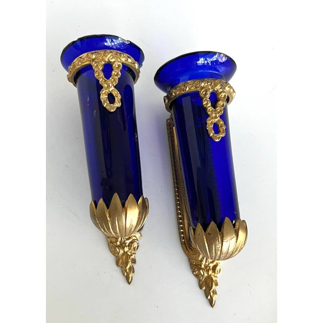 Exquisite Pair of Louis Philippe French Wall Sconces with Sèvres-Style Cobalt Blue Glass Vases A remarkable pair of 19th-...
