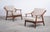 Lounge chairs in teak designed by H. Brockmann-Petersen and produced by Randers Møbelfabrik in the 1960s. A light and...