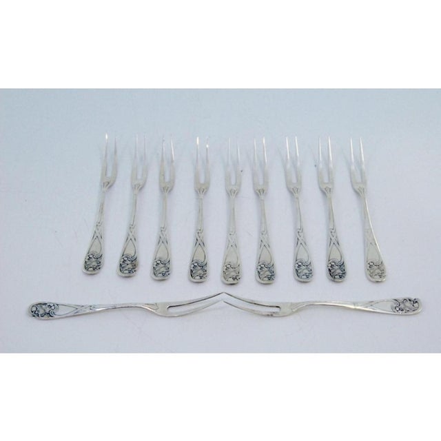 Silver Dessert Forks with Floral Reliefs, Set of 6, in Very Good conditions. Designed from 2000 This piece has an...
